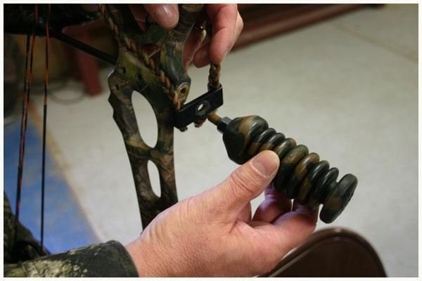 How to attach a bow wrist sling to compound bow stabilizer bushing