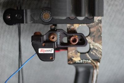 Ripcord drop-away arrow rest installed on compound bow riser